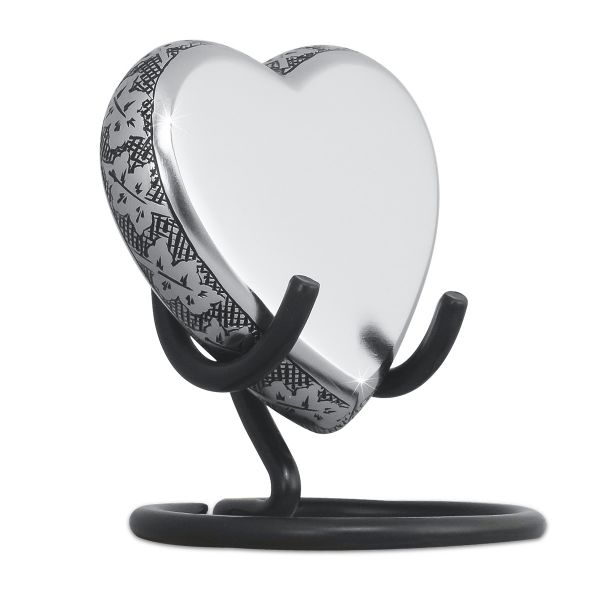Maple leaf silver keepsake representing life, legacy, and a heartfelt connection to cherished memories